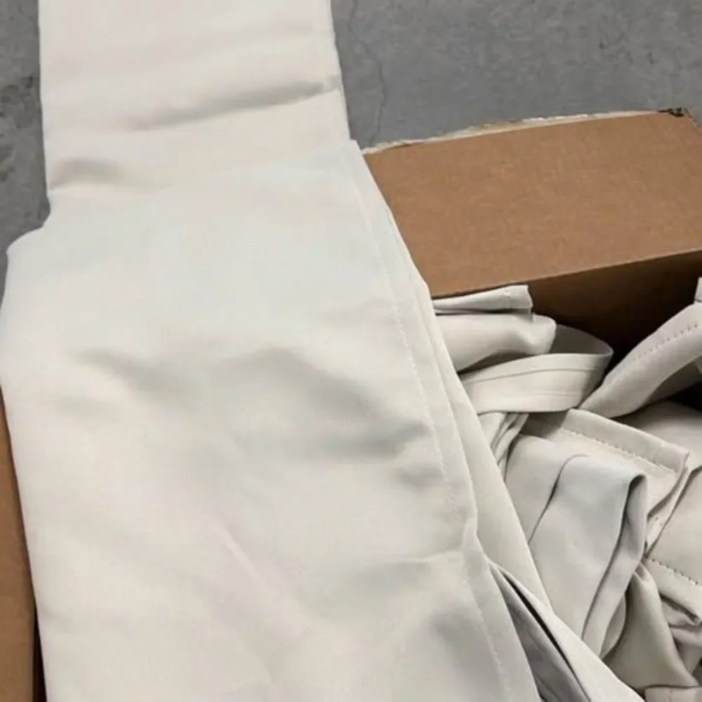 Set of 6 panels of Beige Grommet Top Curtains (3 pairs)
